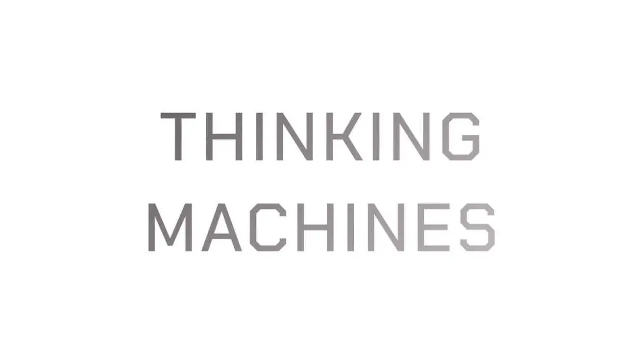 Pildi keskel on tekst 'THINKING MACHINES', mis on kirjutatud hallide suurte trükitähtedega valgel taustal.